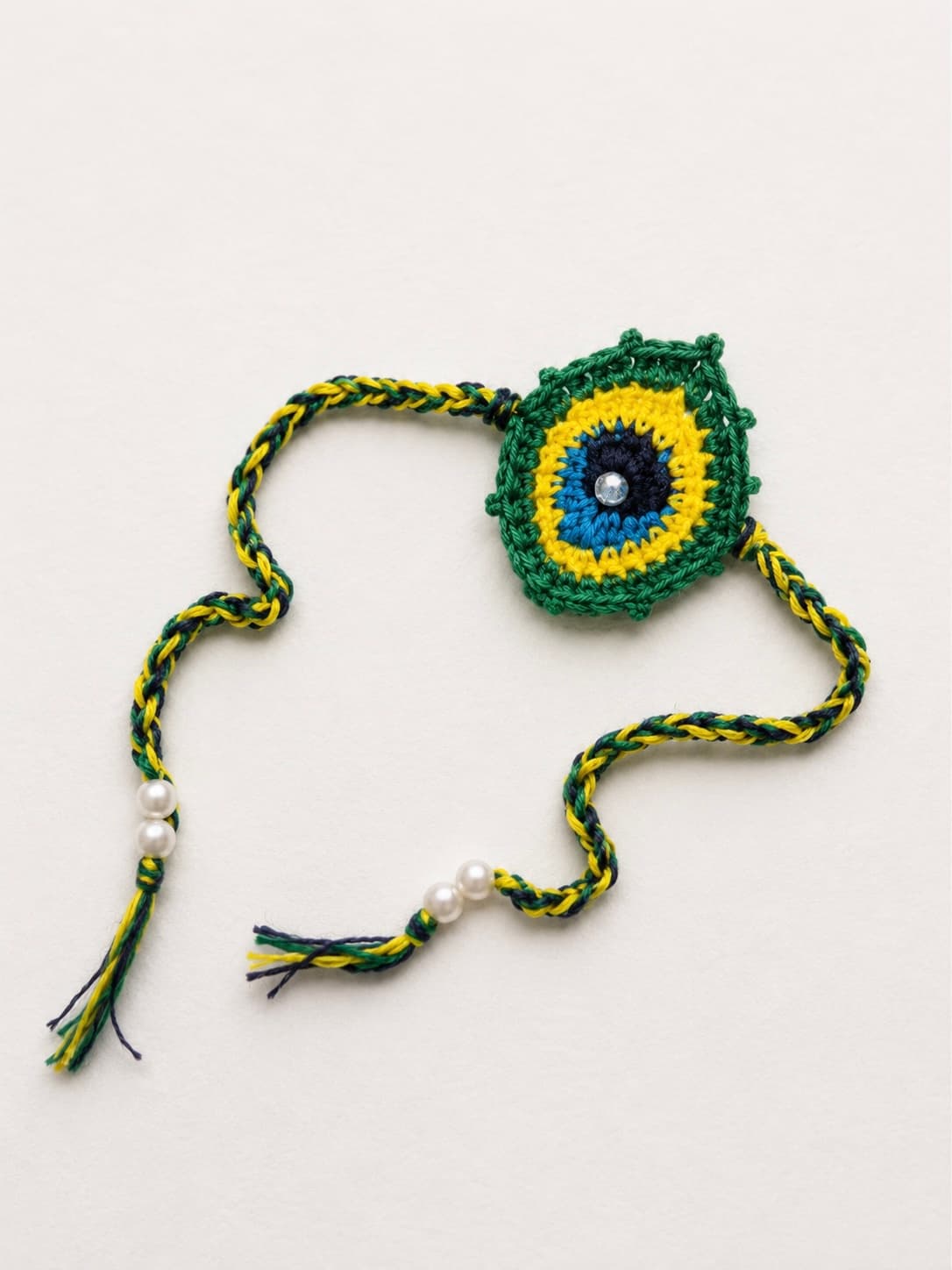 Green Peacock Eye Rakhi handmade crochet product image 1