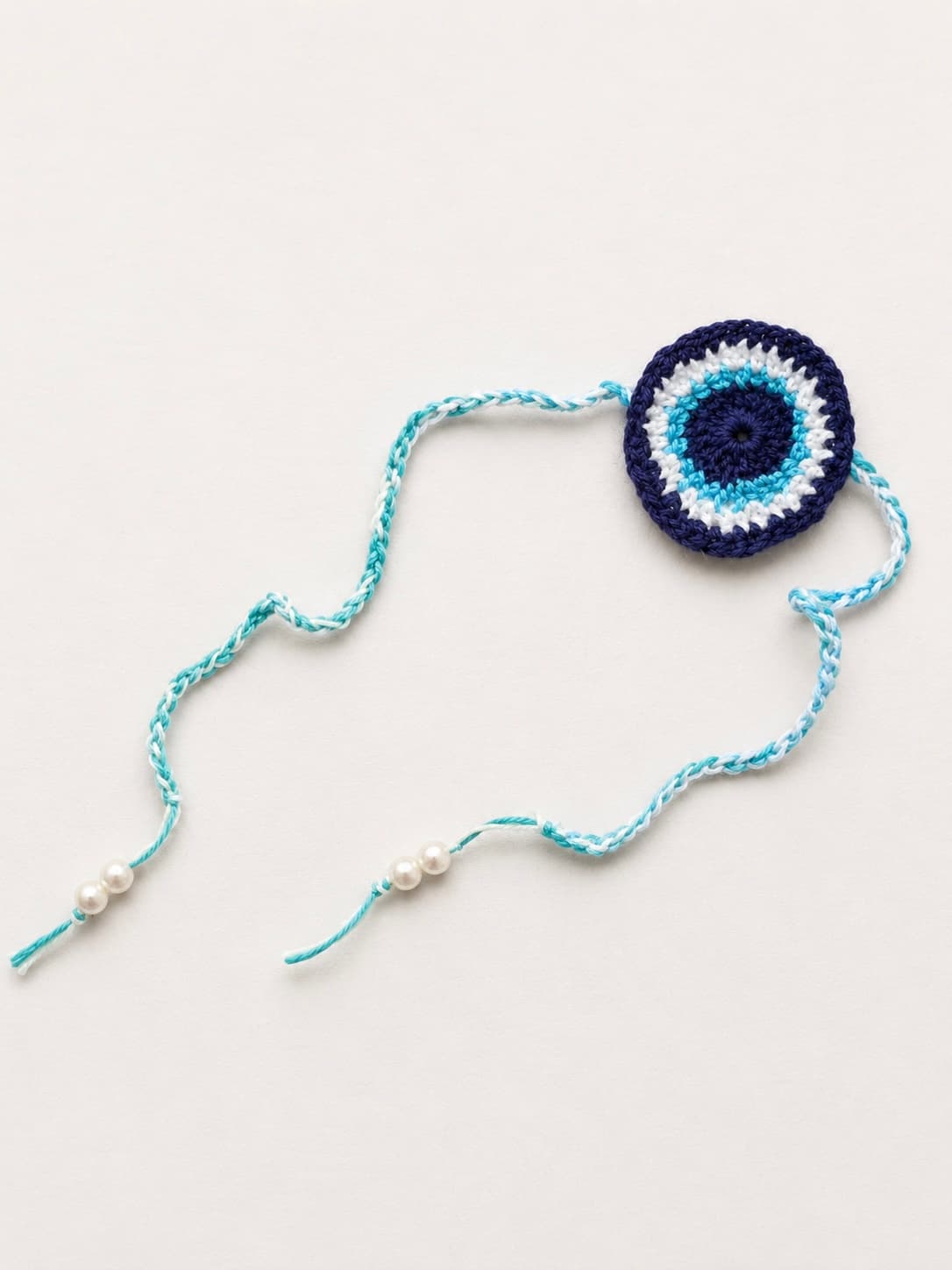 Blue Evil Eye Rakhi handmade crochet product image 1