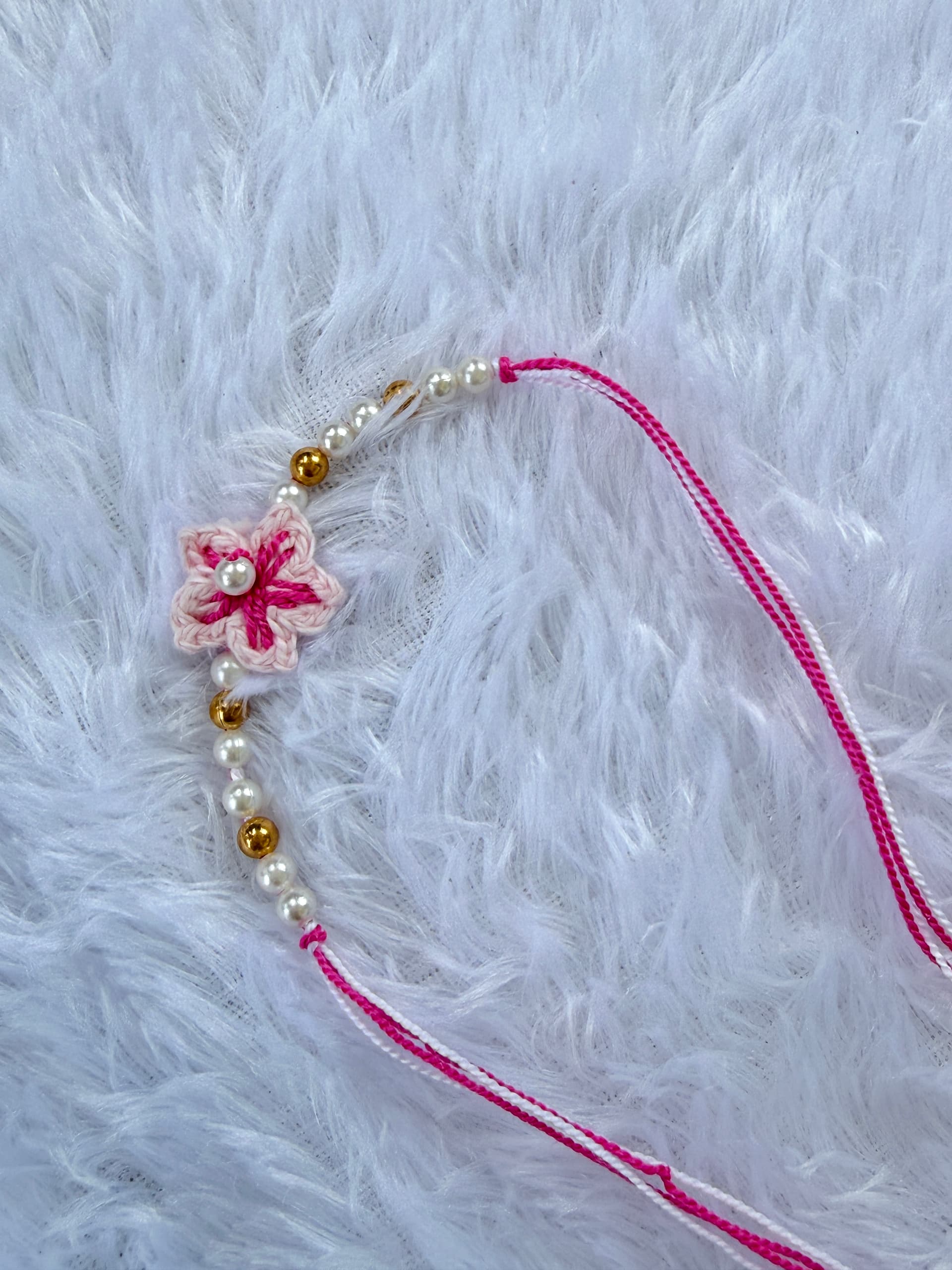 Pink floral rakhi