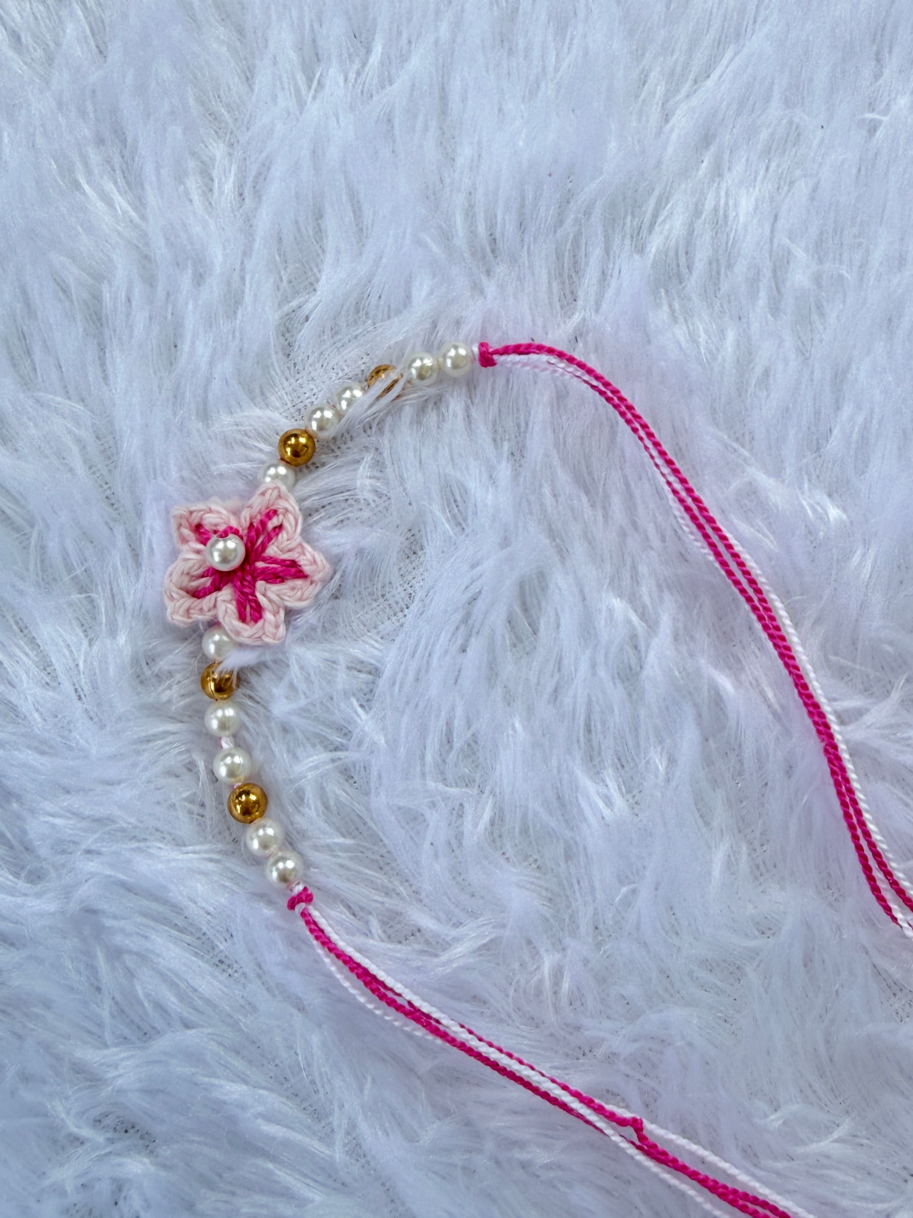 Pink floral rakhi handmade crochet product image 1